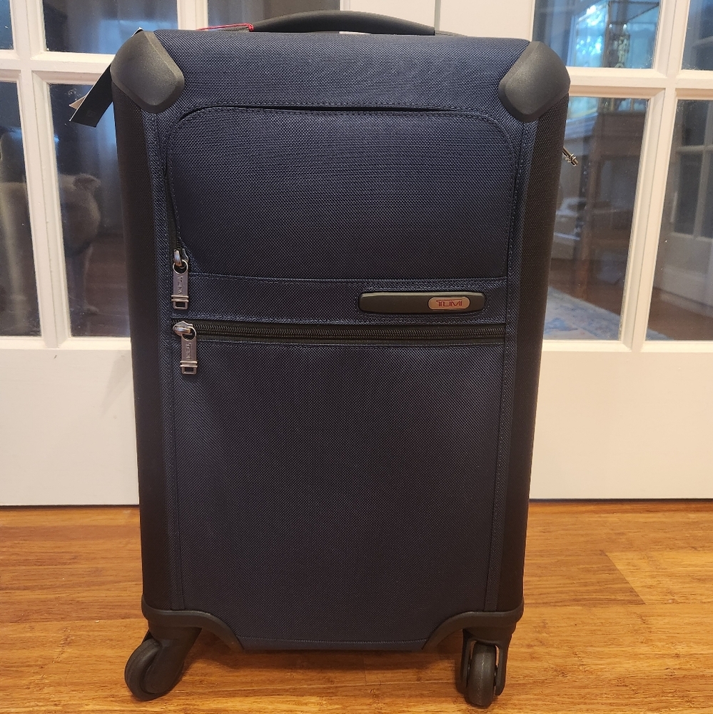 Tumi Dark Blue Spinner Luggage